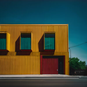 Colorful Modern Building Facade with Geometric Shadows